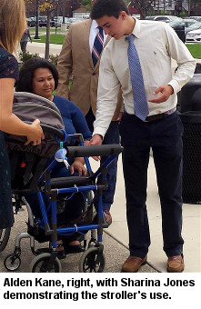 Jones and Kane at a school ceremony acknowledging Kane's achievement.