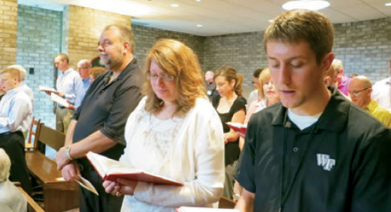 David Inczauskis, SJ, pronouncing first vows in the Society of Jesus in 2016 and (right) with his parents at the Jesuit Novitiate of St. Alberto Hurtado in St. Paul the day he entered as a Jesuit novice in 2014