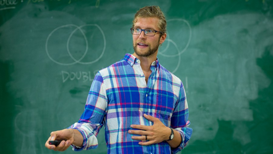 Garrett Gundlach, SJ, teaches at Red Cloud High School. (Photo courtesy of Willi White/Red Cloud Indian School)