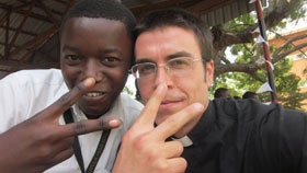 Michael Rossmann, SJ with student from Tanzania